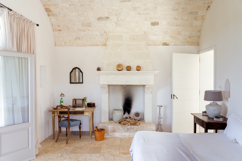 Masseria Petrarolo bedroom with firespace
