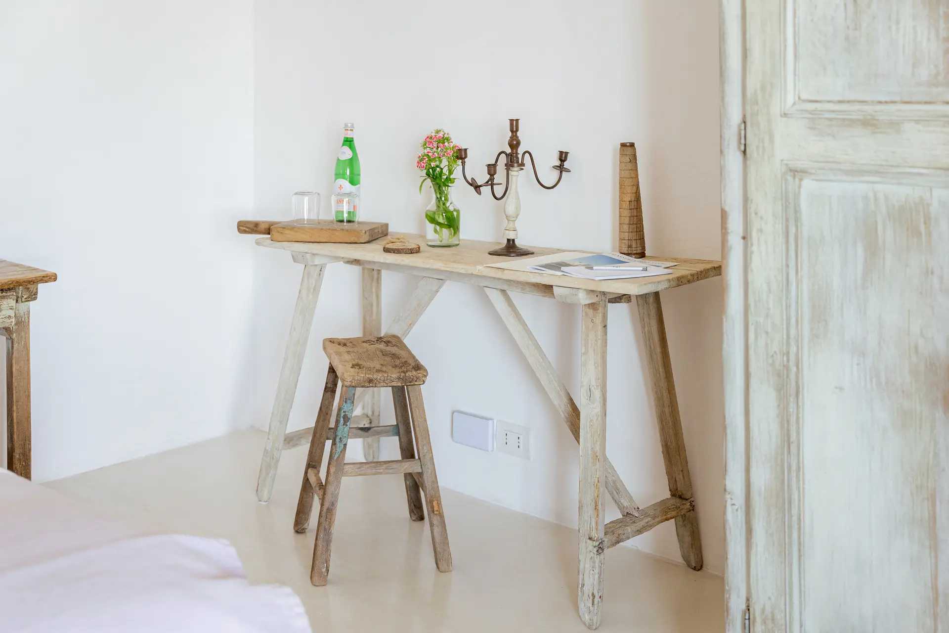 Masseria Petrarolo interior workspace with minimalist design