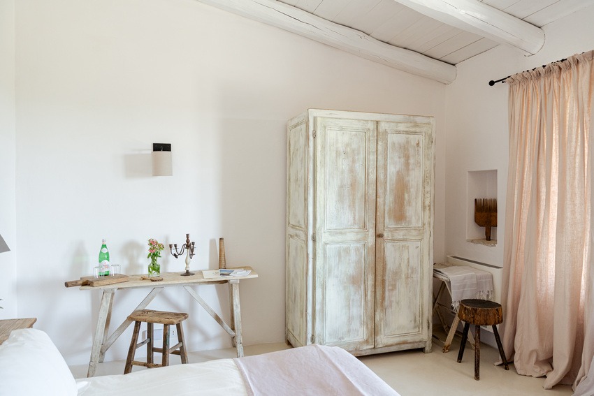 Masseria Petrarolo bedroom with simple layout and natural light