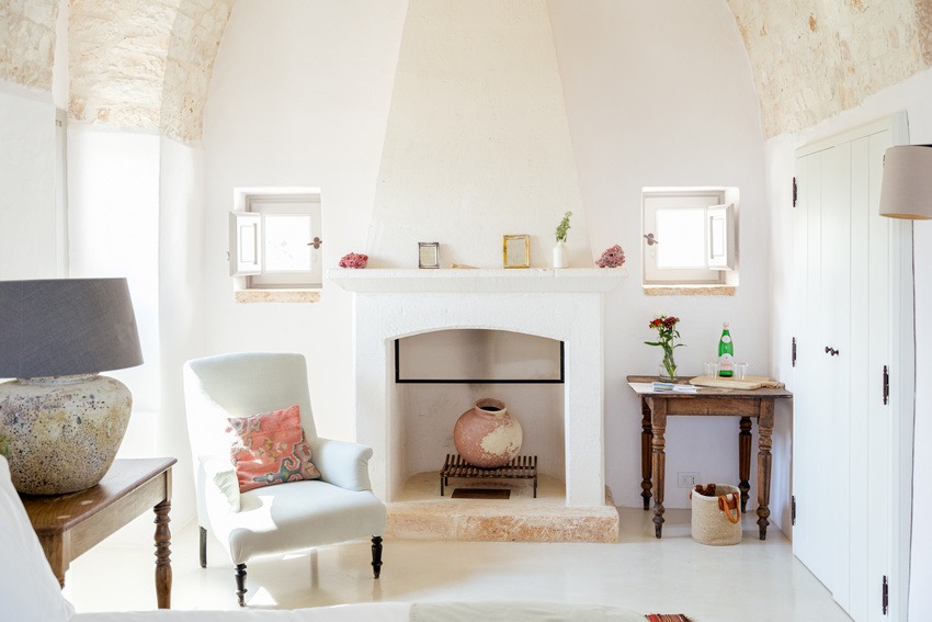Masseria Petrarolo bedroom with stone walls and natural light