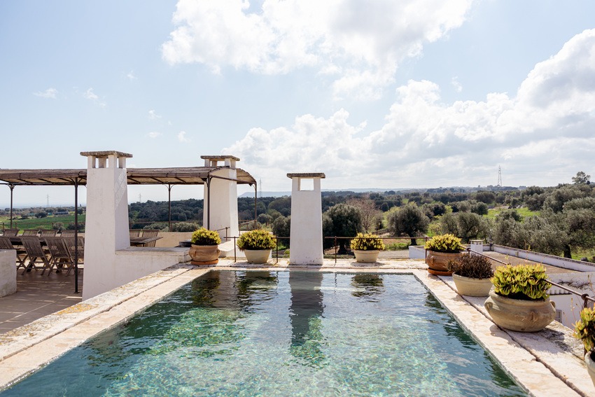 Masseria Petrarolo rooftop pool with panoramic countryside view