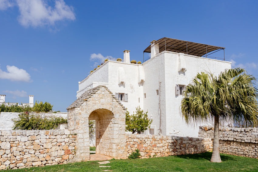 Traditional Italian architecture and Mediterranean vegetation at Masseria Petrarolo