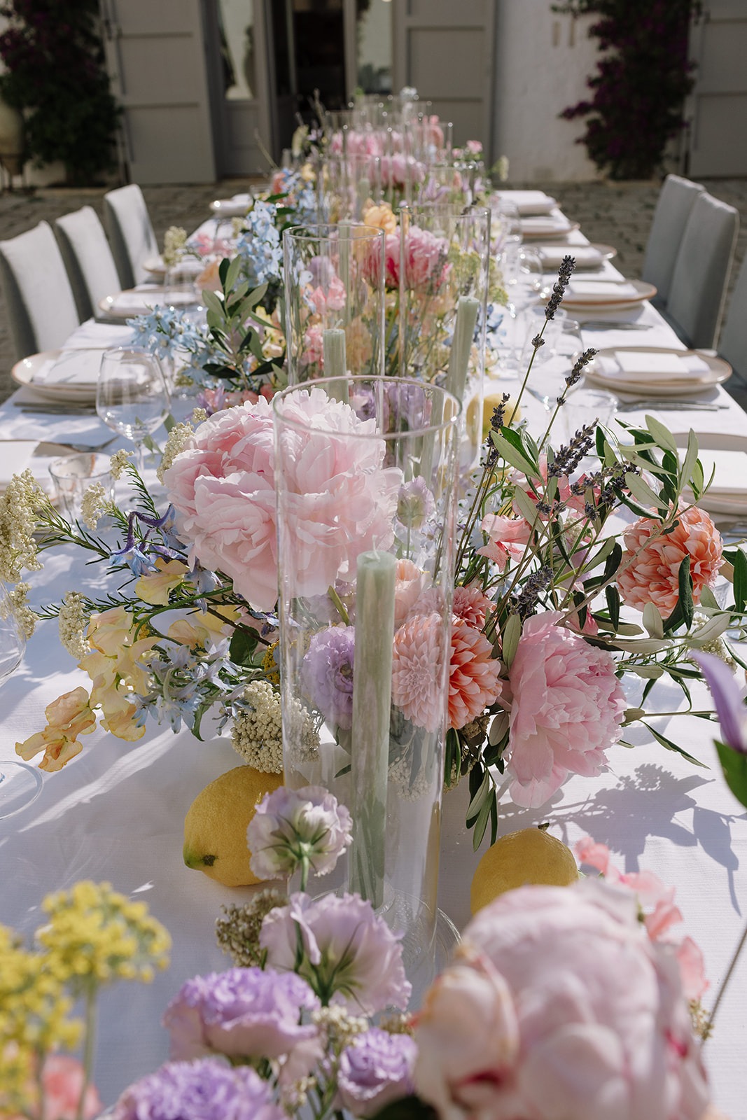Wedding flowers and place settings at Petrarolo
