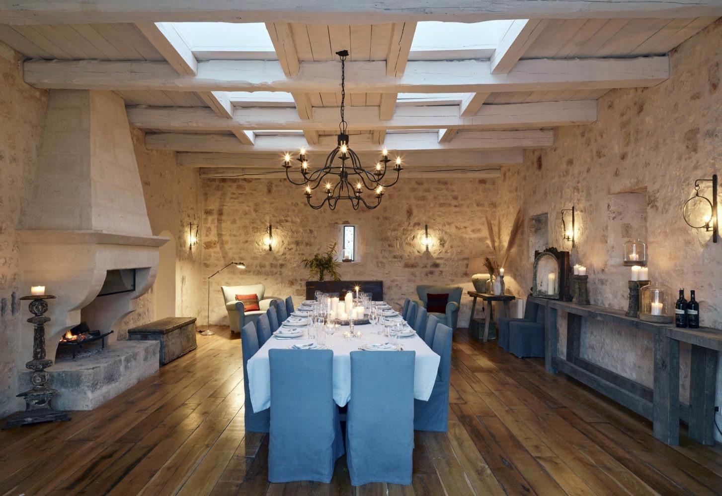 The dining room set for a candlelit dinner